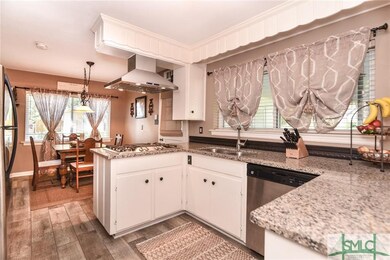 Kitchen with new tile floor, new granite counters 