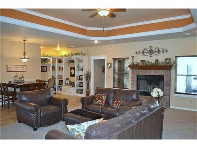 Living Room. Open living with fireplace, tray ceil