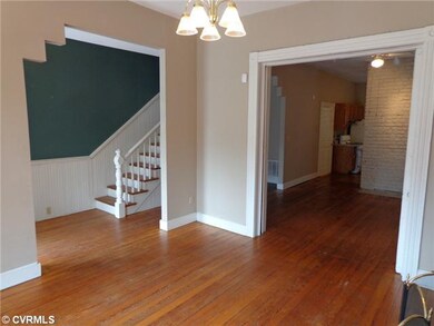Living Room - Looking into the foyer and dining ro