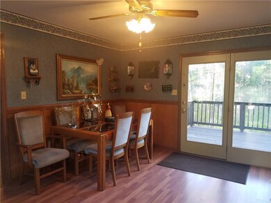 Dining area/foyer with atrium door...