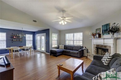 Walk down the short hallway into the living room