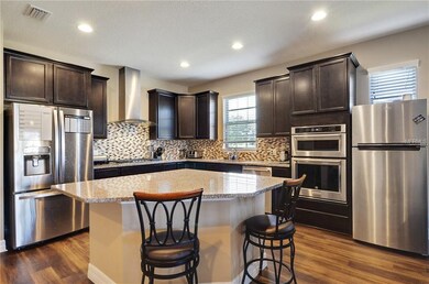 Pie Shaped Center Island with Seating