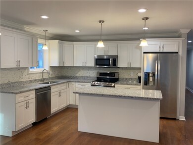 Kitchen with Granite Counters and Stainles Steel A
