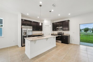 890 Pebble Crest Ln, Eagle Lake, FL 33839 - photo 6