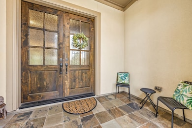 The elegant double door entry makes a grand first