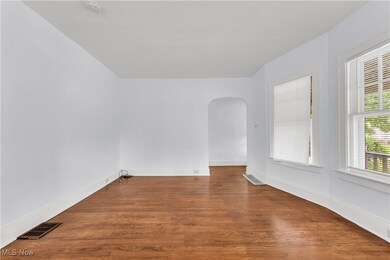 Unfurnished room with wood-type flooring