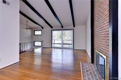 Hardwood floors are found throughout the living sp