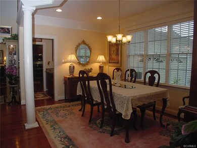 Dining room has new brushed nickle chandelier + re