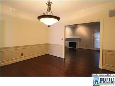 The dining room opens to the living room and kitch