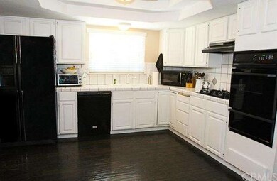 Spacious open kitchen with separate large pantry.