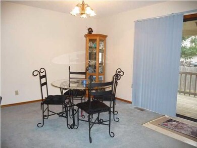 Dining area with sliding glass doors to covered de
