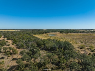 View of property location featuring a large body of water and rural landscape