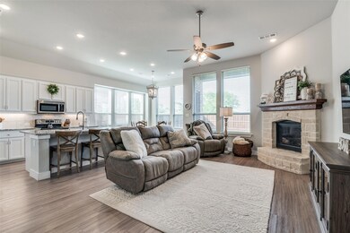 Warm & Inviting Family/Living Area w/ Austin Stone Fire Place!