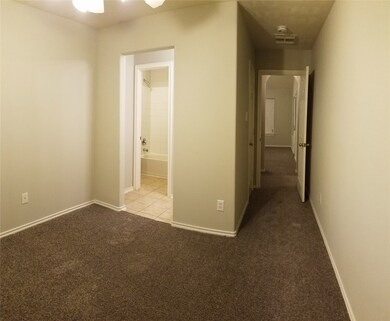 Bedroom two with entrance to bathroom and hallway