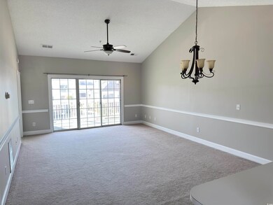 Carpeted empty room with vaulted ceiling, ceiling 