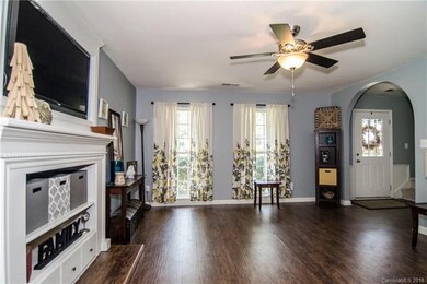 The fireplace has been converted to an adorable built in bookcase ... but can be restored to fully functional.