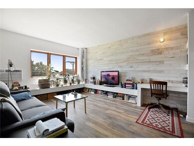 The wood statement wall makes a stylish focal poin