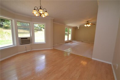 DINING ROOM AREA INTO SECOND FAMILY ROOM. PIPE REA