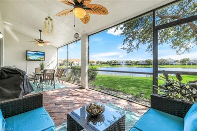 Sunroom / solarium with a ceiling fan, outdoor dining area, a water view, and a patio