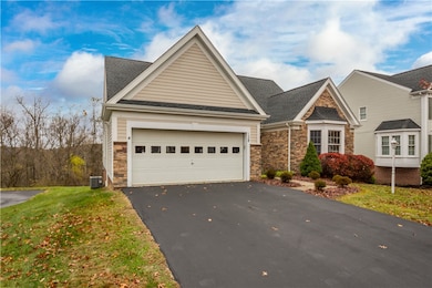 A LEVEL DRIVEWAY PLUS AN ATTACHED 2 CAR GARAGE ARE A BONUS!