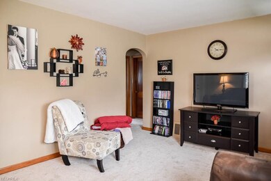 Hardwood flooring under the carpet in the living r