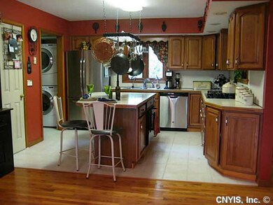 Kitchen. Ceramic tile floor and stainless steel ap