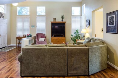 The living room accommodates large furniture and l