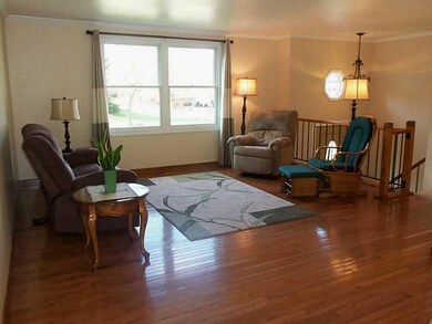 Living Room. GLEAMING HARDWOOD FLOORS IN THE LARGE
