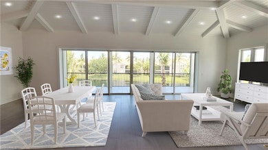 Living area with wood finished floors, a wood ceiling with exposed beams, and recessed lighting