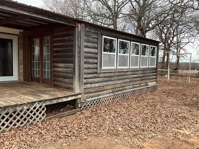 View of home's exterior with a deck