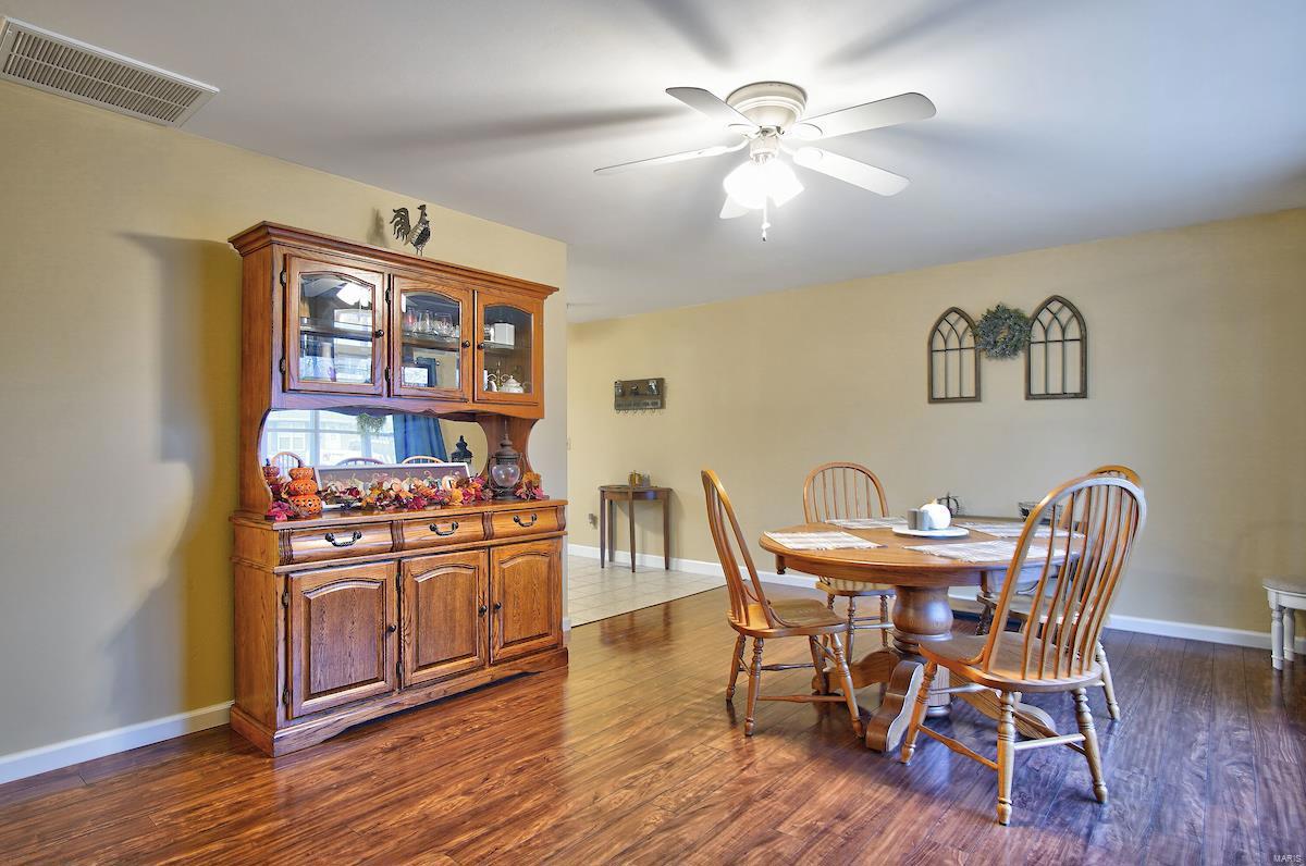 Amazing front room is currently utilized as a dini
