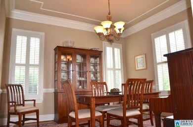 with hardwood floors, heavy crown molding and ceil