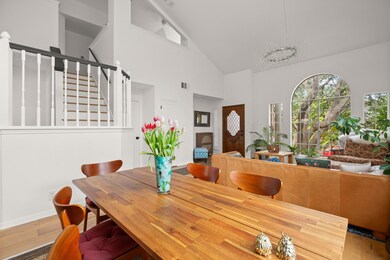Dining room featuring wood finished floors, high 