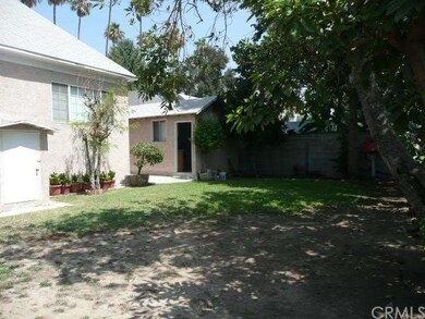 back yard view and basement entrance.