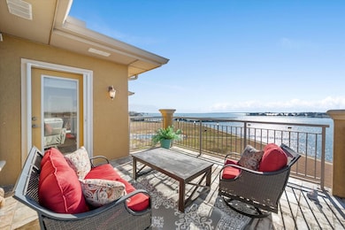 Balcony with an outdoor living space and a water v