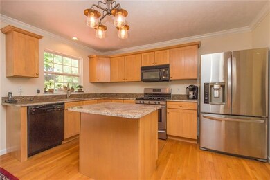 Pristine kitchen with upgraded cabinets, granite c