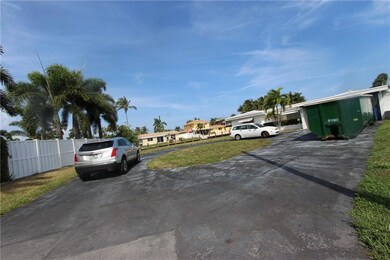 FRONT OF HOUSE AND VACANT PORTION OF LOT