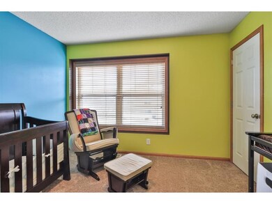 Second bedroom is bright and cheery.