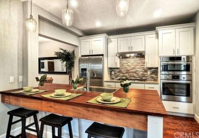 The spectacular kitchen features a unique solid ha
