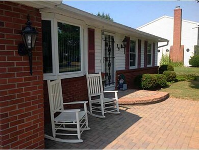 Exterior Front. The walkway in front is both beaut
