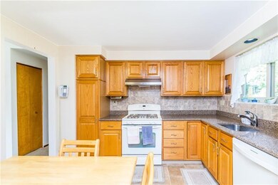 KITCHEN 11X10:  Eat in kitchen has new oak cabinet