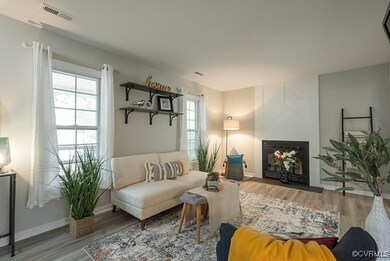 Sitting room featuring hardwood / wood-style floor