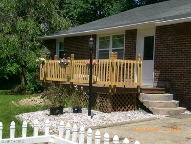 New front deck with New front door with decorative
