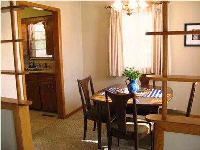 Make note of the accent shelves separating the din