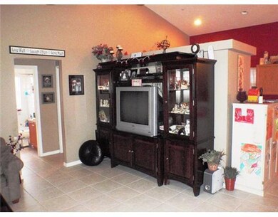 Kitchen. Oak Cabinets, White Appliances, High Ceil