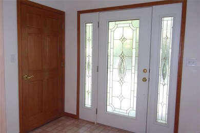 Front door with sidelights, also front coat closet