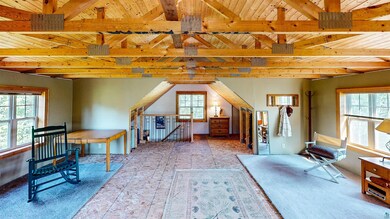 Interior space featuring wood ceiling and vaulted 