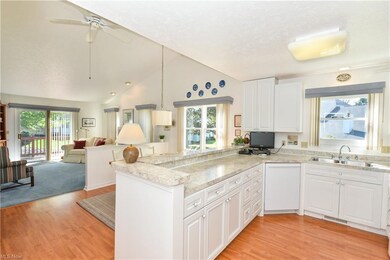 The kitchen, dining area and great room are the heart of the home.