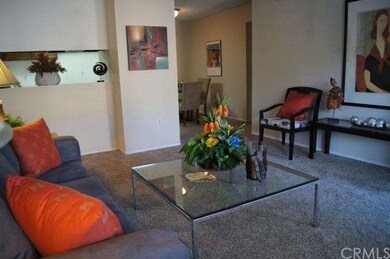 Spacious living room with brand new carpet through