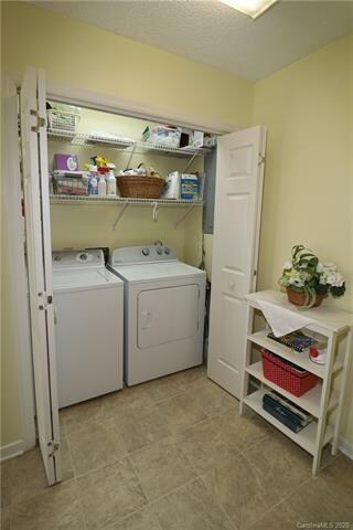 Washer / dryer closet located in the kitchen.